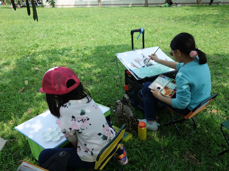 Child painting with creative expression