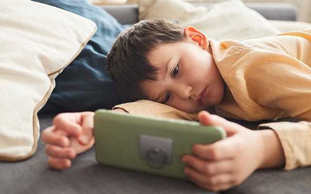 Child looking at a screen
